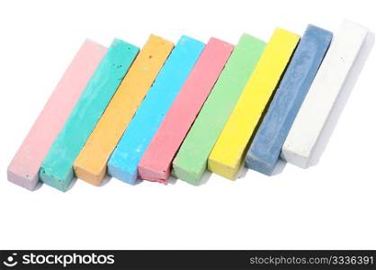 Colored crayon chalk on a white background isolated.