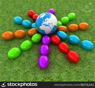 Colored Easter eggs around Earth on a green grass