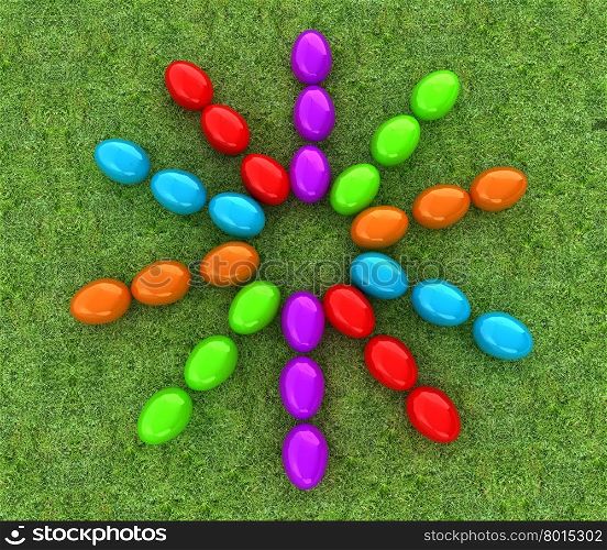 Colored Easter eggs as a flower on a green grass