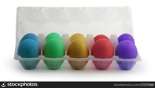 Colored Easter eggs in a plastic box on isolated background
