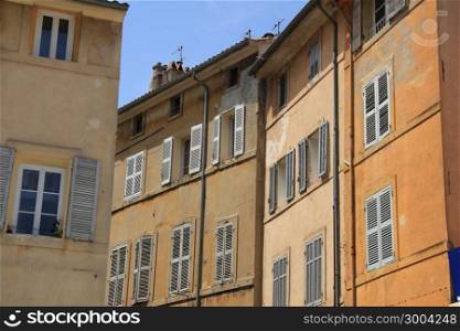 Colored facades in a street in Aix en Provence