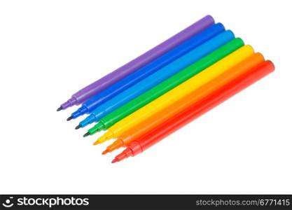 Colored felt pens lie in a row, isolated on white background, studio shot, field, top view