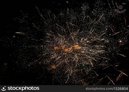 colored Fireworks on Deep Black Background Sky on Fireworks festival show before independence day on fourth of July or new year.. colored Fireworks on Deep Black Background Sky on Fireworks festival show before independence day on fourth of July or new year