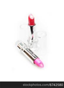 colored lipstick balm closeup isolated on white