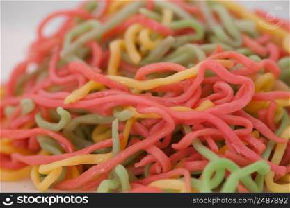 colored noodles closeup. food ingredients closeup