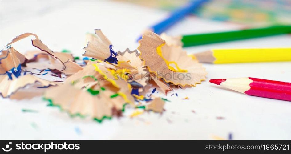 colored pencils and sharpened pencil shavings