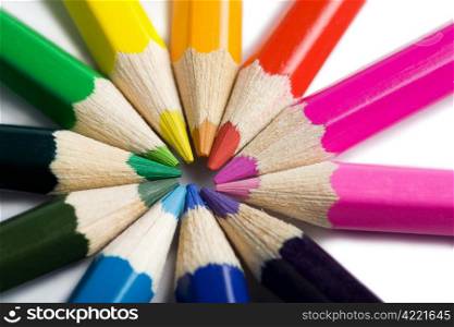 colored pencils in round shape