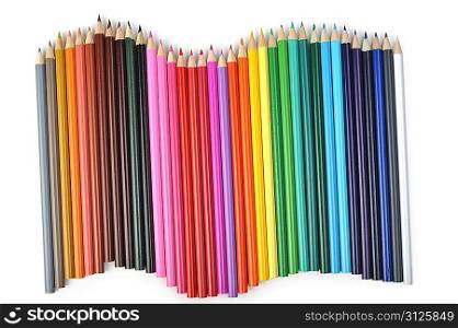Colored pencils lined up in row