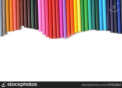 Colored pencils lined up in row