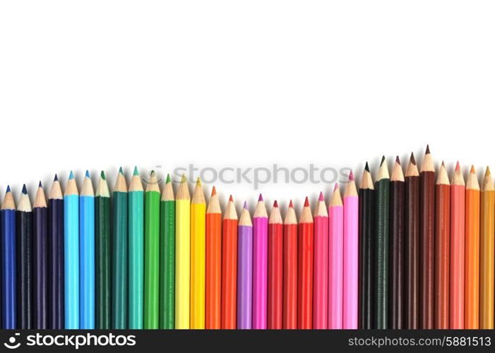 Colored pencils lined up in row