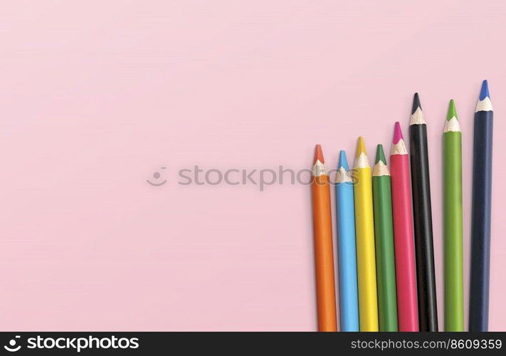 colored pencils on a pink background