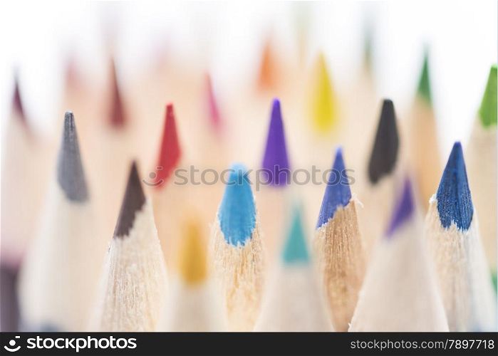 colored pencils on a white background