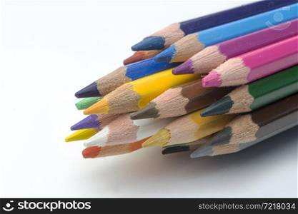 Colored pencils on a white background for drawing.. Color pencils on white background
