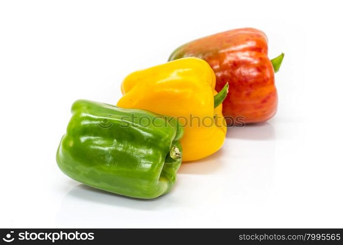 colored peppers over white background, Fresh vegetables sweet Peppers or Bell peppers