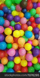 Colored plastic toy balls of different colors