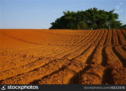 Colored plowed field with rows in Myanmar