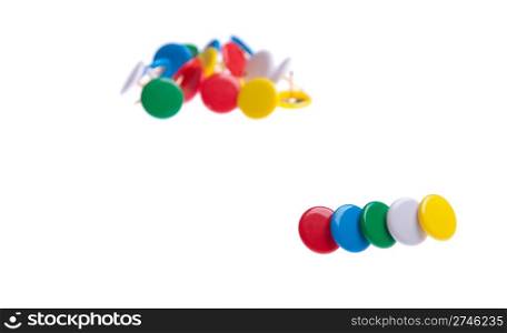 colored push pins isolated on white background (shallow depth of field)