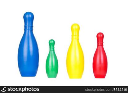 Colored skittles with different sizes on an isolated white background.