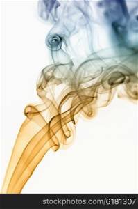 colored smoke from a cigarrette in white background