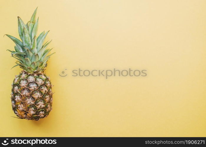 colored surface with pineapple. High resolution photo. colored surface with pineapple. High quality photo