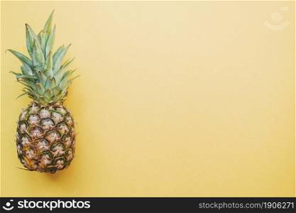 colored surface with pineapple. High resolution photo. colored surface with pineapple. High quality photo