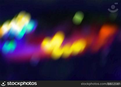 Colorful abstract dynamic defocused light trails. Decorative backdrop with sparks flying.. Sparks flying around. Colorful lights swirling around colored background.