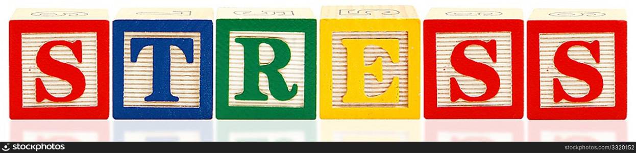 Colorful alphabet blocks spelling the word STRESS