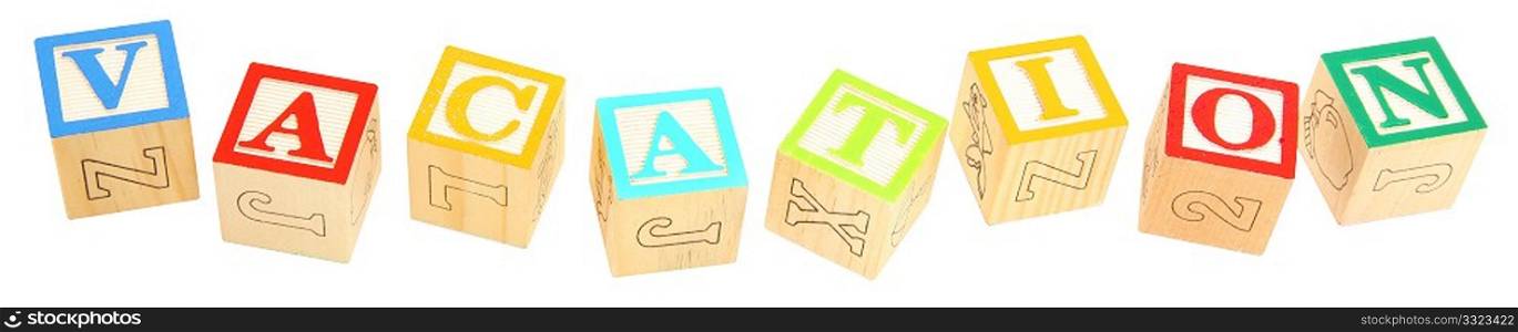 Colorful alphabet blocks spelling the word VACATION in capital letters.