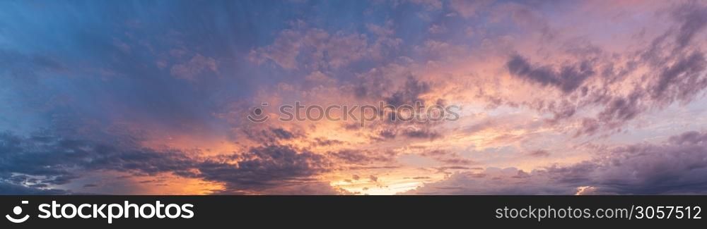 Colorful and dramatic sky panorama of sunset background. vivid and contrast storm clouds. Colorful and dramatic sky panorama of sunset background