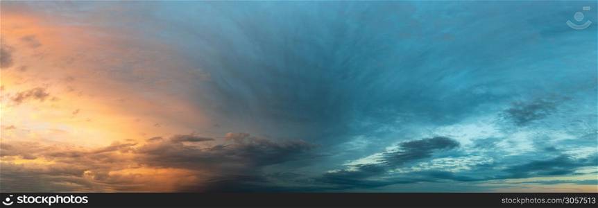 Colorful and dramatic sky panorama of sunset background. vivid and contrast storm clouds. Colorful and dramatic sky panorama of sunset background
