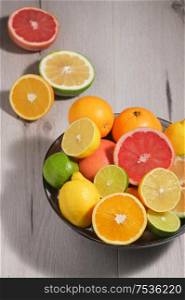 Colorful Assortment Of Citrus Fruit on Wooden Table