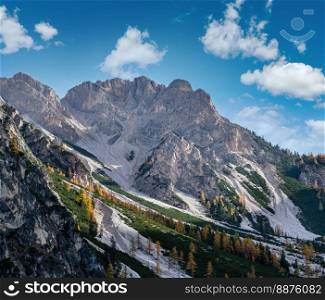 Colorful autumn evening alpine rock scene. View from hiking path near lake Braies or Pragser Wildsee, South Tyrol, Dolomites Alps, Italy.