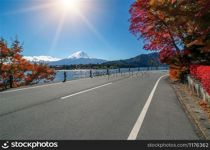 Colorful Autumn in Mount Fuji, Japan - Lake Kawaguchiko is one of the best places in Japan to enjoy Mount Fuji scenery of maple leaves changing color giving image of those leaves framing Mount Fuji.. Mount Fuji in Autumn Color, Japan