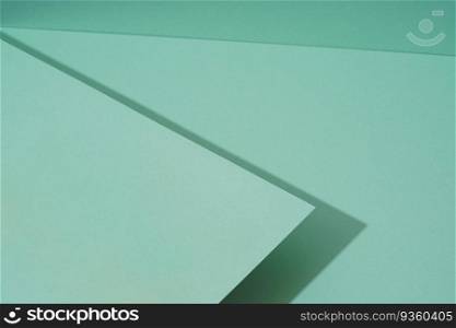 Colorful background from green paper with shadow. Abstract geometric. The colorful background from green paper with shadow. Abstract geometric