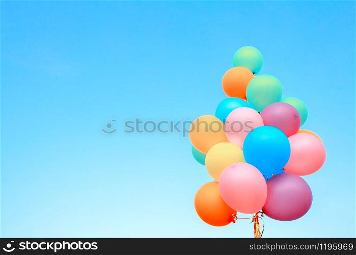 Colorful balloons done with a retro on bluesky backgroud