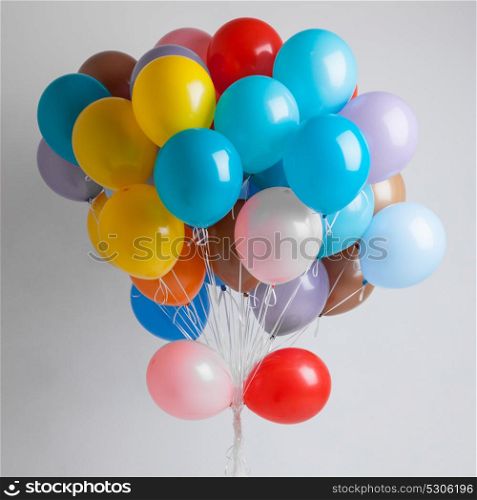 Colorful balloons on white. Many Colorful balloons on white background