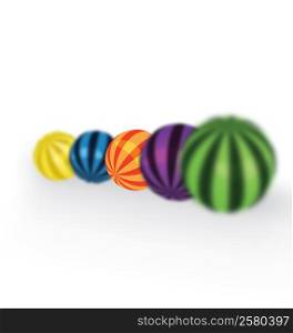 Colorful balls on a row with shallow depth of field