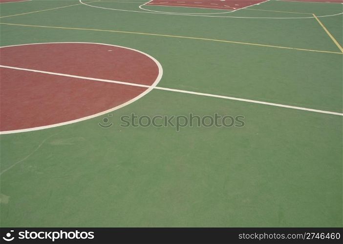 colorful basketball lines on an outdoor court