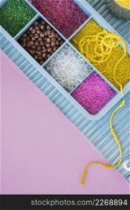 colorful beads blue case placemat pink background