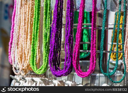 Colorful beads of various color at a market