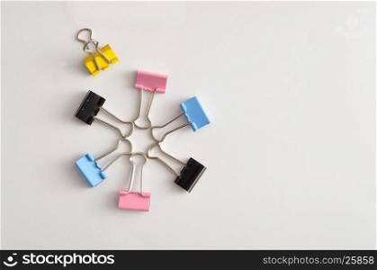 Colorful binder clips in the shape of a star