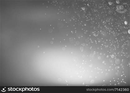 Colorful bokeh background from water spray.