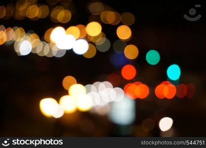 colorful bokeh lights in the street at night