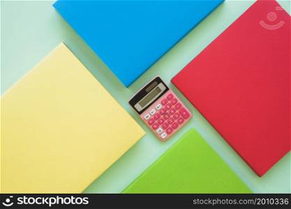 colorful books with calculator center