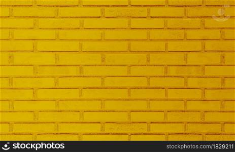 Colorful brick wall, bright yellow vintage style of brickwork background paint with texture details.