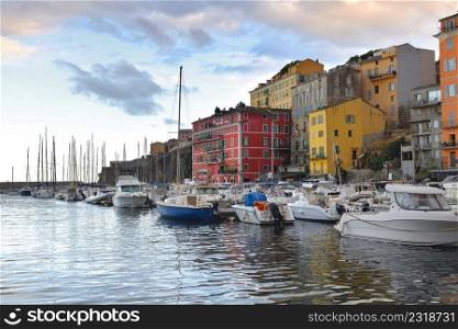 colorful buildings and boats in the port of Bastia in Corsica