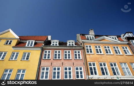 colorful buildings in the area of nyhavn a popular area in copenhagen