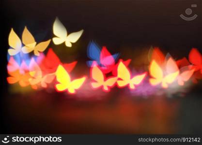 Colorful butterfly blured (bokeh) at beautiful night.