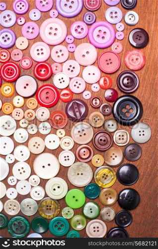 Colorful buttons as a rainbow background for design