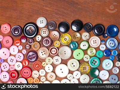 Colorful buttons as a rainbow background for design